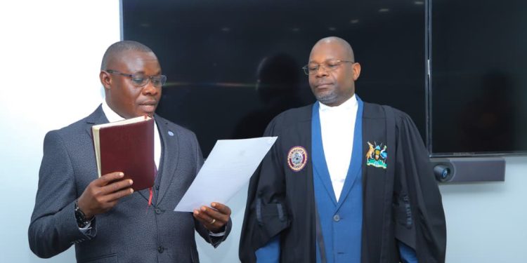 Moses R. Mauku Sworn In to APRM National Governing Council Representing Workers